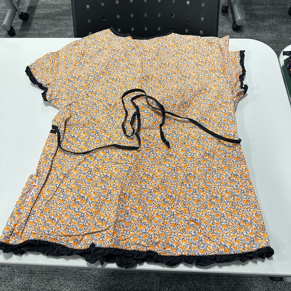 Ladies size xs (3) and small (4) Halloween scrub tops. - Picture 7 of 15